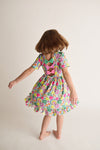 LUCKY CHARMS BACK BOW TWIRL DRESS
