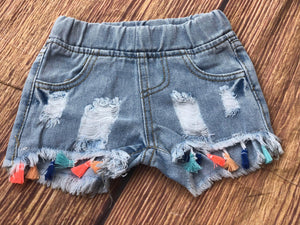 DISTRESSED TASSEL DENIM SHORTS