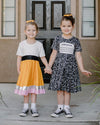 COMPOSITION BOOK TWIRLY DRESS